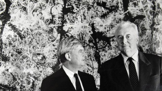 National Gallery of Australia director James Mollison and former Prime Minister Gough Whitlam stand in front of Jackson Pollack's <i>Blue Poles</i> in 1986.