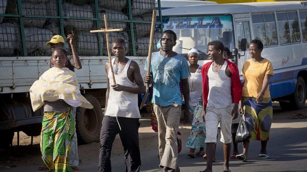 Carrying a crucifix as a sign of impartiality in Bujumbura on Thursday.