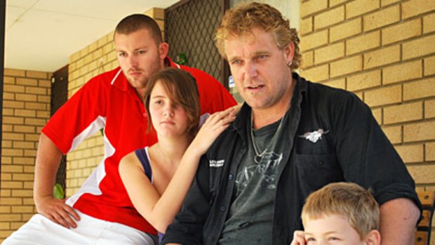 Iveta Mitchell’s husband Chad, sons Peter (left) and Kyle and daughter Alana just want her to come home.