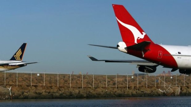 Qantas passengers were evacuated at Sydney Airport.