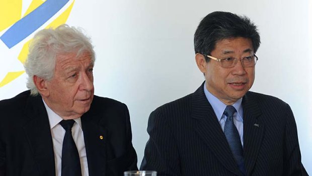 Frank Lowy with Zhang Jilong, acting president of the Asian Football Confederation, during an official reception in Sydney yesterday.
