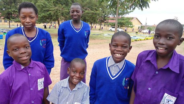 These Ugandan children will never complain about the opportunity to gain an education.