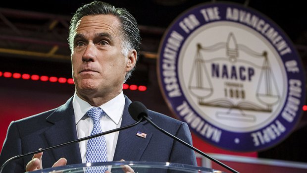 Mitt Romney speaks at the NCAAP national convention, drawing boos from the crowd.