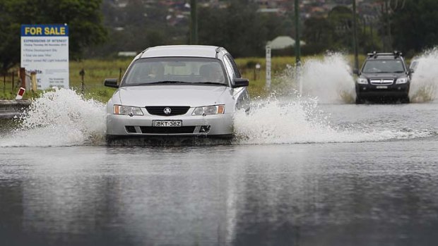 Wild weather: Flooding over summer can be attributed to an increase in the accumulation of greenhouse gasses in the atmosphere, report says.