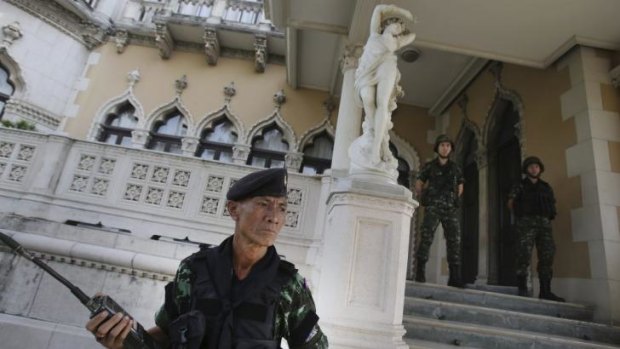 Force in politics: Thai soldiers stand guard outside the prime minister's office in Bangkok.