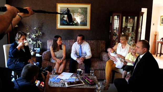 Opposition Leader Tony Abbott visited Rosie Hopgood (left) at her Beaconsfield home in Melbourne's south east where he had morning tea with her and her friends.
