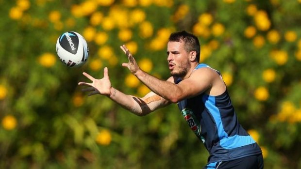 NSW five-eighth Josh Reynolds goes through his paces at Coffs Harbour on Thursday.