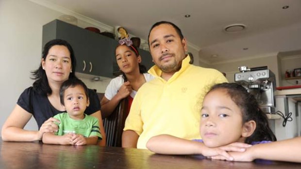 Childcare at risk ... Cindy Matias with children Miguel, Katrina and Beatriz and husband John. They face a $600 levy.