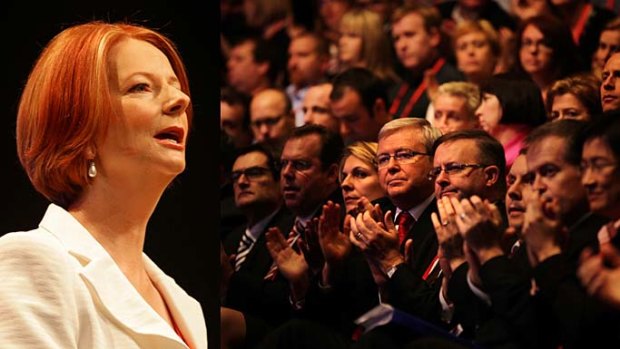 Julia Gillard speaks at the Labor national conference at Sydney's Darling Harbour yesterday, prompting applause from the party faithful, including Foreign Minister Kevin Rudd.