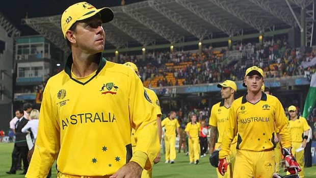 Ricky Ponting of Australia leads his team from the field after their loss.