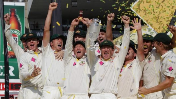 Peter Siddle, third from left, celebrates the Ashes triumph.
