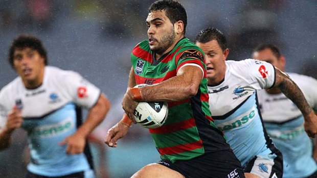 Welcome sight ... Greg Inglis bursts clear.