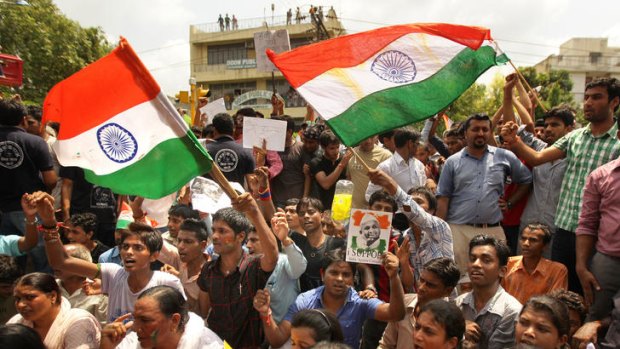 Thousands of activists gather at the main gate of Tihar Jail in support of Anna Hazare, earlier this week.