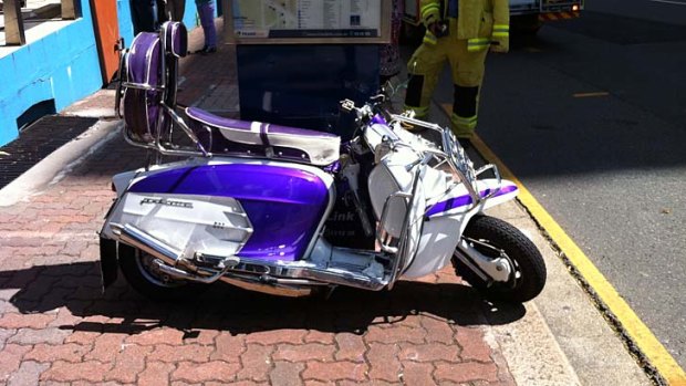 A man was riding this scooter when it collided with a car at the Wharf and Adelaide Streets intersection in Brisbane's CBD.