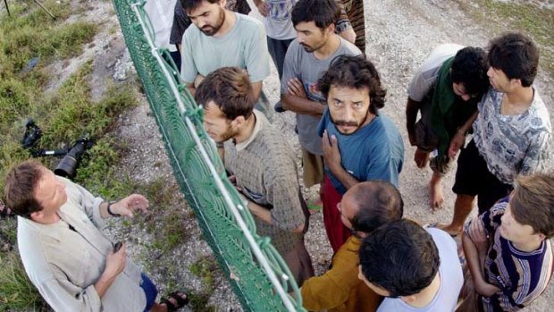 No man's land ... asylum seekers talk to international journalists from their camp in Nauru in 2001.