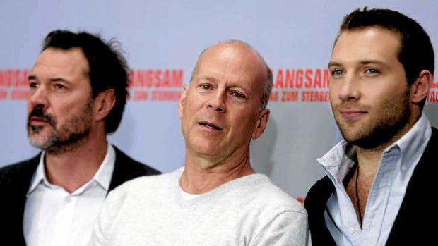 Big shot: Bruce Willis with co-stars Sebastian Koch (left) and Jai Courtney at a promotion for <i>A Good Day to Die Hard</i>.