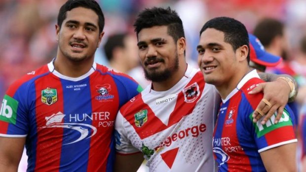 Brothers in arms: Chanel (L), and Sione (R) with Peter who plays for the Dragons.