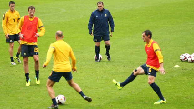 Hawkeye: Ange Postecoglou watches the Socceroos go through their paces at their first session in Sydney this week.