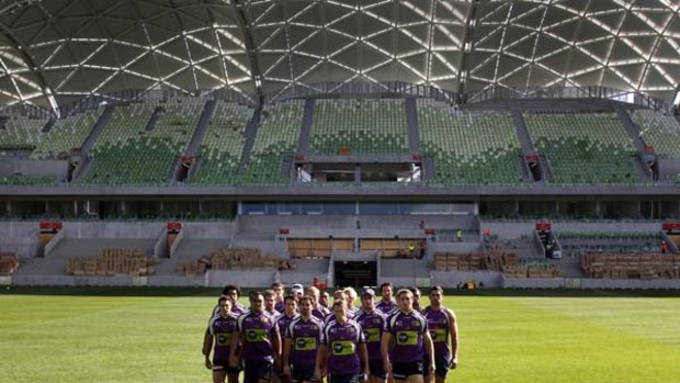 United front ... Melbourne players prepare to attend a press conference at AAMI Park yesterday.