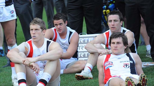 Dal Santo and fellow Saints show their disappointment after the loss to Collingwood in the 2010 grand final replay.