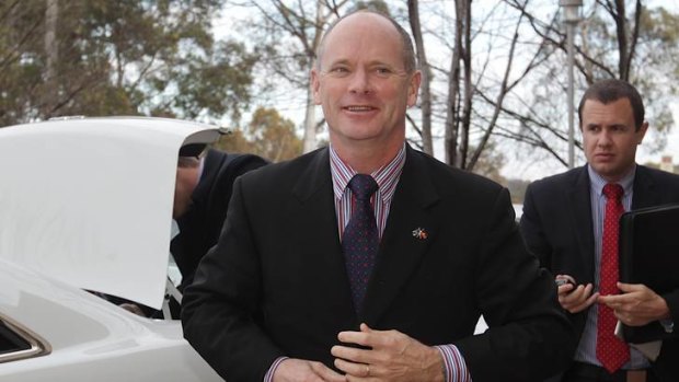 Queensland Premier Campbell Newman arrives at Parliament House for the Council of Australian Governments (COAG) meeting in Canberra
