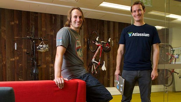 Geek heaven: Chris Kiehl (left) and Joris Luijke (right) in the Sydney offices of Atlassian.
