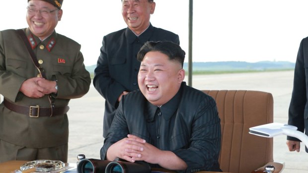 North Korean leader Kim Jong-un attends what was said to be the test launch of an intermediate range missile on September 16.