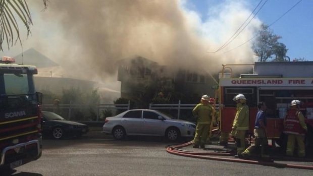 Fire crews at the scene of a house fire in Wynnum.