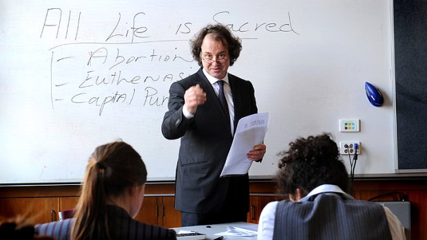 From stump to school: Julian McGauran lectures a year 11 class on public speaking.