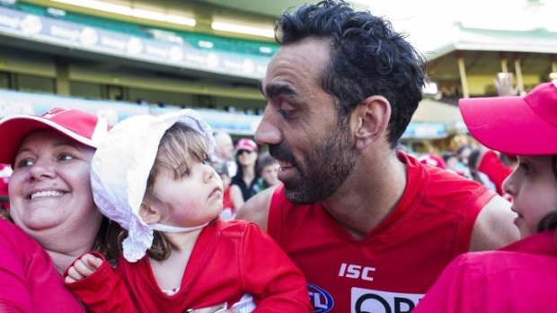 Man of the people: Goodes poses with a young supporter earlier this week.