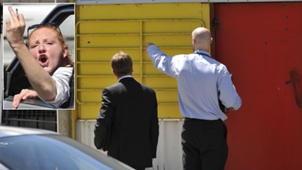 Police count the bullet holes at the clubhouse today and (inset) a woman who said she was the dead man's niece makes her feelings clear.