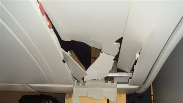 Roof damage in the A330's cabin: 'It just looked like the Incredible Hulk had gone through there in a rage and ripped the place apart,' Kevin Sullivan recalls.