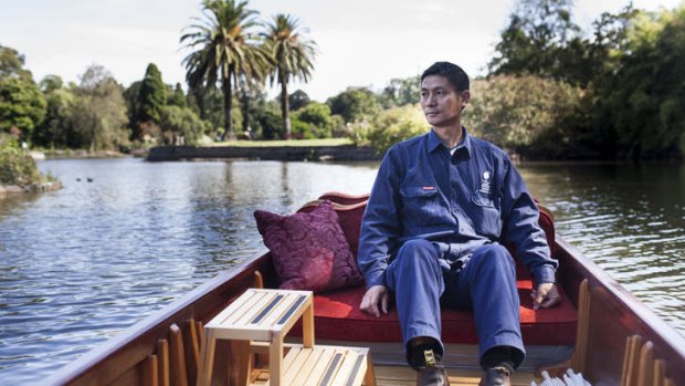 Steven Liu takes in the Royal Botanic Gardens from a punt.