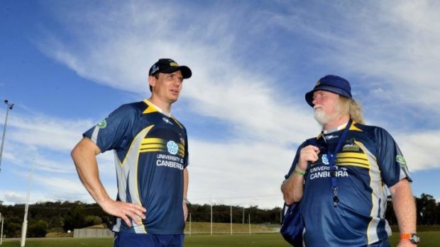 Stephen Larkham signed a three-year deal on Sunday which will see him take charge of the Brumbies under a traditional coaching model when director of rugby Laurie Fisher departs to Europe at the end of the Super Rugby season.