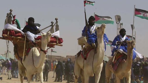 A camel division of the Polisario Front army of the Saharawis who were evicted from their land in Western Sahara in 1975. Australia's phosphate comes from this disputed territory, with calls for the import to stop until the Saharawis can return to their home.