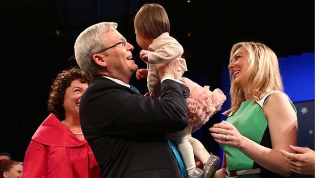 Prime Minister Kevin Rudd with his granddaughter Josephine, wife Therese Rein and daughter Jessica at the ALP campaign launch.