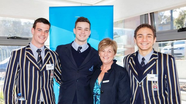 The Canberra Grammar School Eggheads were the highest team fundraisers for this year's World's Greatest Shave, raising $27,000, the most ever raised by an ACT school for the event. Representing the school are William Herse, Lachie Martin and Dion Tsarpalias with the Leukaemia Foundation's Belinda Barnier.