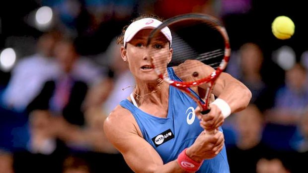 Tough day for seeds: Samantha Stosur of Australia plays a backhand in her match against Jelena Jankovic of Serbia.