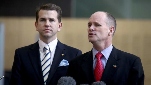 Queensland Premier Campbell Newman (R) and Attorney-General Jarrod Bleijie's contentious anti-bikie legislation could be short-lived, the Premier says.