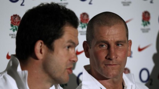 Stuart Lancaster (R) is announced as England rugby's interim head coach .
