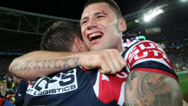 Shaun Kenny-Dowall celebrates after playing 65 minutes with a broken jaw.