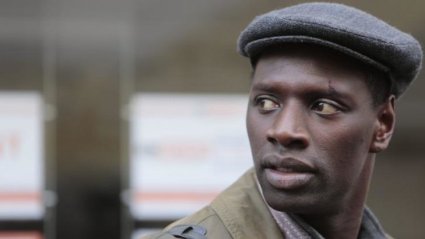 Omar Sy as illegal immigrant Samba Cisse.