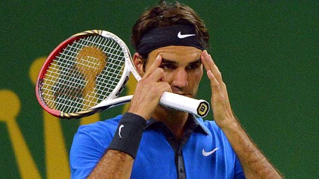 Roger Federer appears rattled during the match against Stanislas Wawrinka.