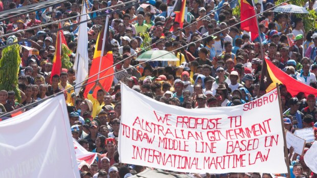 At least 10,000 people protest in Dili last year against Australia's stance on the oil and gas meridian line in the Timor Sea. 