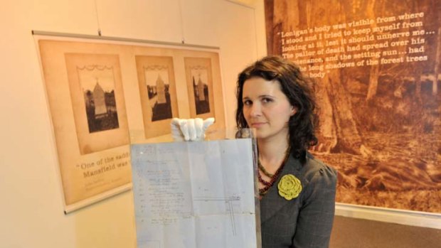 MCJ Fr Sep 9 2011 Elizabeth Marsden, Collections Manager at the Victoria Police Museum, holding the map showing the site of the  Kelly Gang's Stringybark Creek ambush site hand drawn by Constable Thomas McIntyre, the only survivor of the a shoot-out.The Age/News, Picture Michael Clayton-Jones, Melbourne, Story Paul Miller