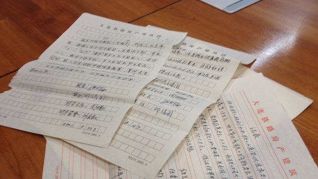 Documents Zhou Shiqin says show the money she is accused of embezzling was used legitimately.