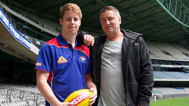 Bulldogs recruit Lachlan Hunter with father Mark.