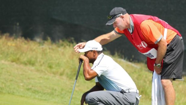 Tiger Woods wants silence after being distracted during the first round at Royal Liverpool.