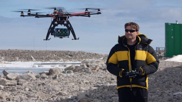 A researcher from the University of Tasmania  trialling a drone.