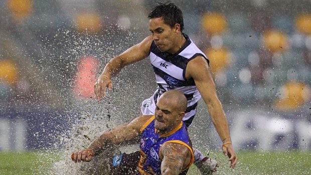 Splashdown: Lion Ash McGrath and Cat Mathew Stokes slip and slide in search of the Sherrin.